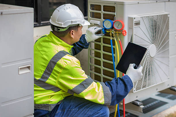 Professional Heat Pump Repair technician working in Outlook, WA